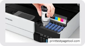 Person opening printer lid to check ink cartridges and paper tray
