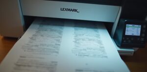 Test page showing poor and improved print quality of Lexmark printer